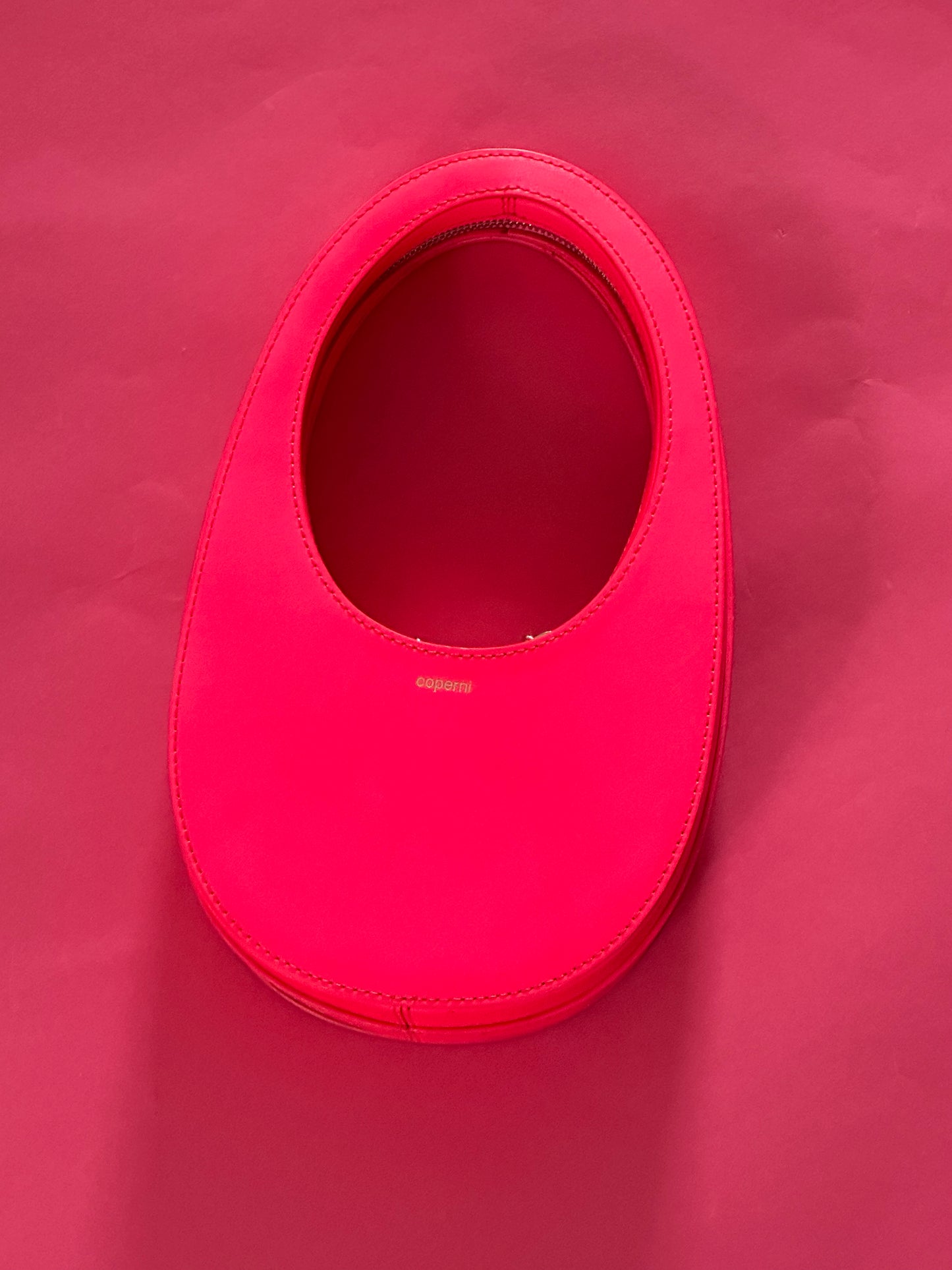 COPERNI hot pink moon purse