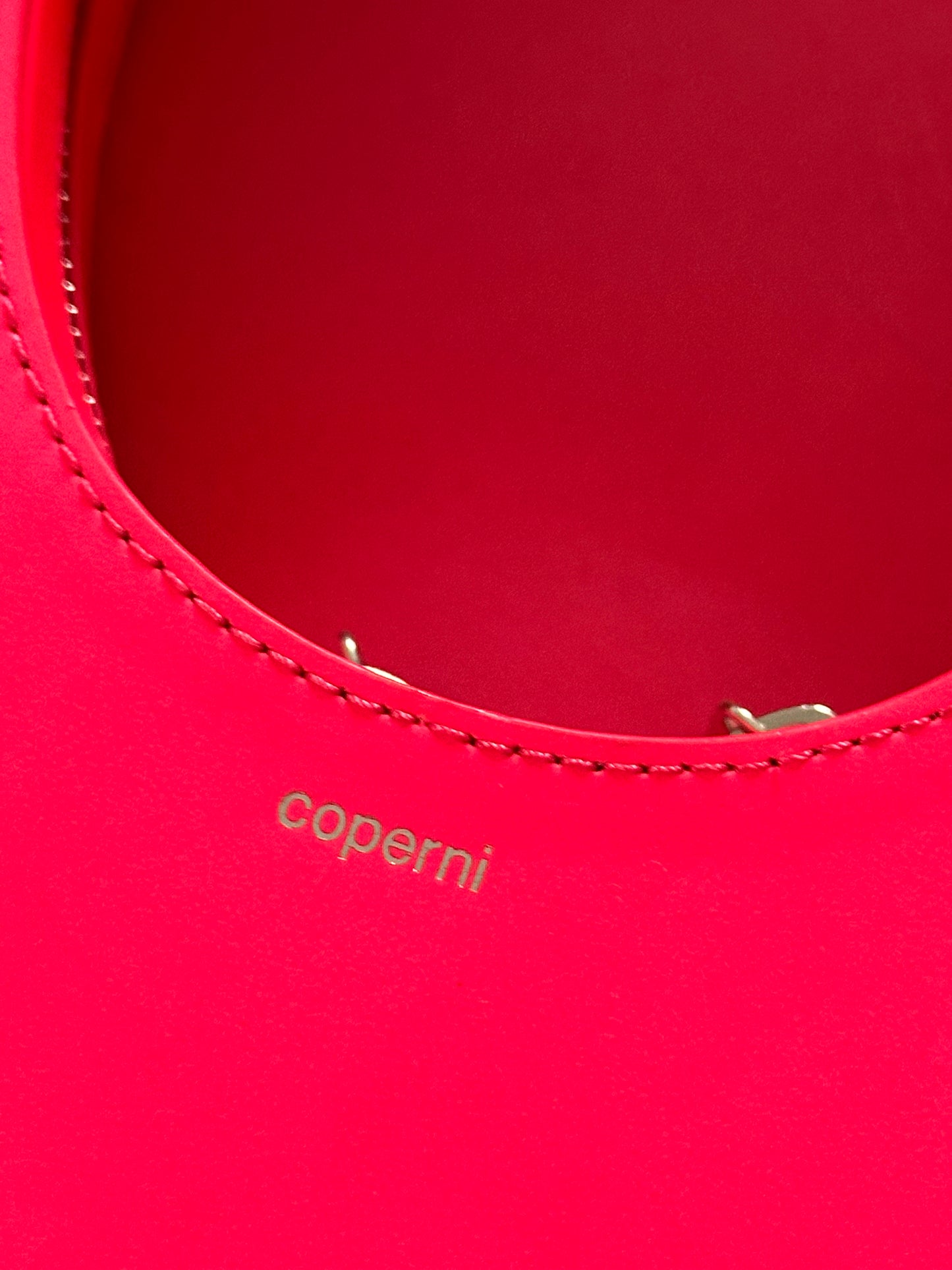 COPERNI hot pink moon purse