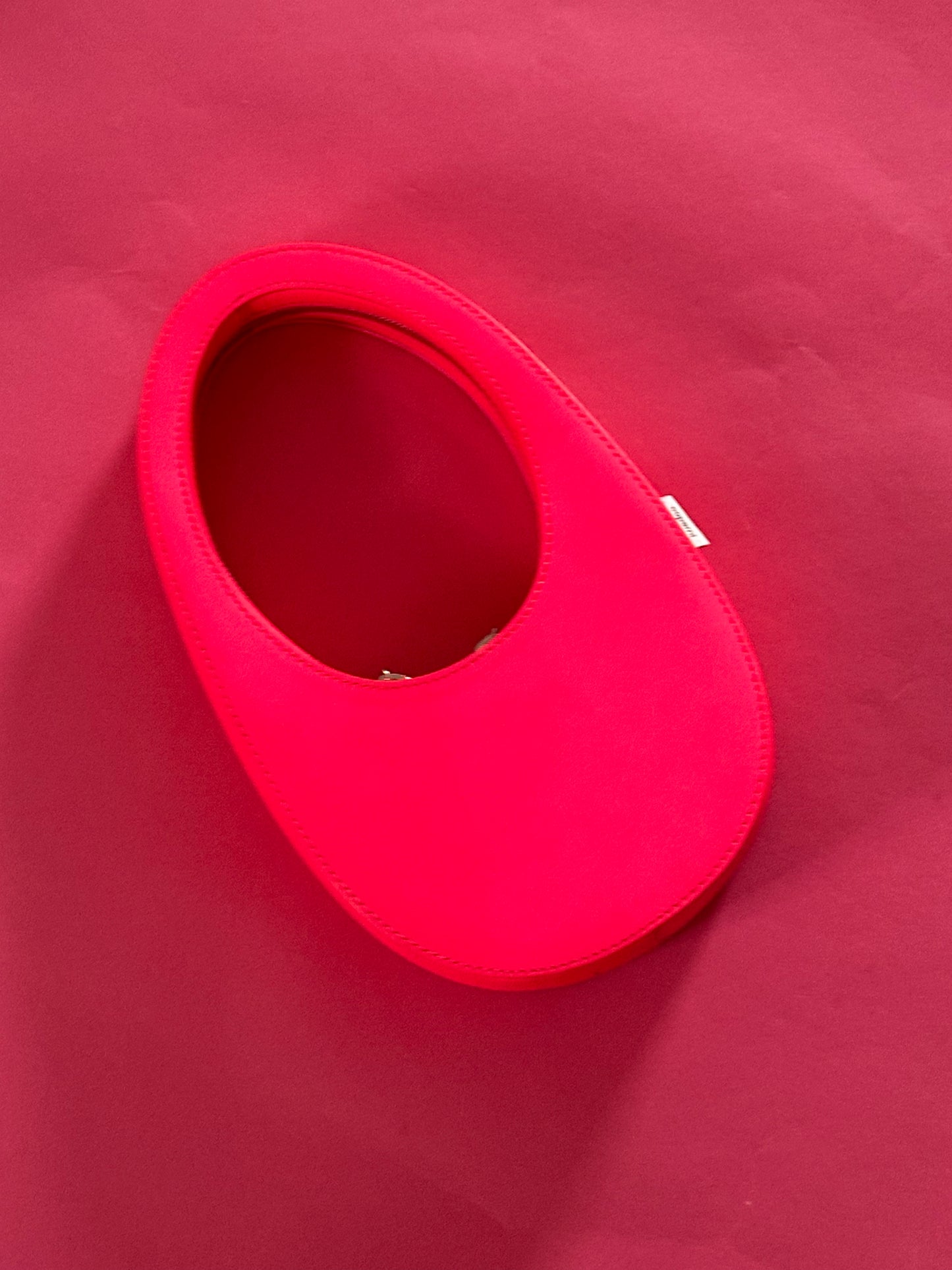 COPERNI hot pink moon purse